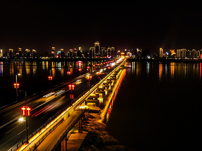 繁华城市夜景摄影照片_江西南昌城市桥梁夜景摄影图配图