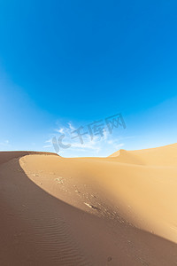 沙漠蓝天摄影照片_沙漠风光下午沙漠室外摄影摄影图配图