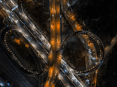 俯拍城市高架桥交通夜景摄影图配图