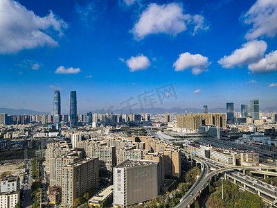 城市高楼摄影照片_云南中午昆明城市航拍摄影图配图