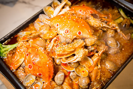 美食鱿鱼美味螃蟹热气摄影图配图