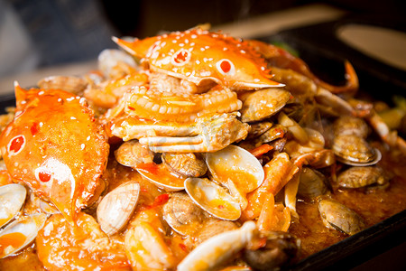 螃蟹美味摄影照片_鱿鱼餐饮海鲜螃蟹热气摄影图配图