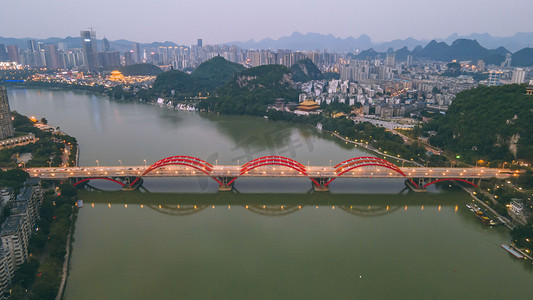 桥夜色摄影照片_城市夜景柳州文惠桥江边航拍摄影图配图