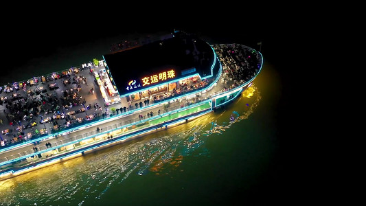 航拍重庆两江夜游夜晚行驶的客轮轮船