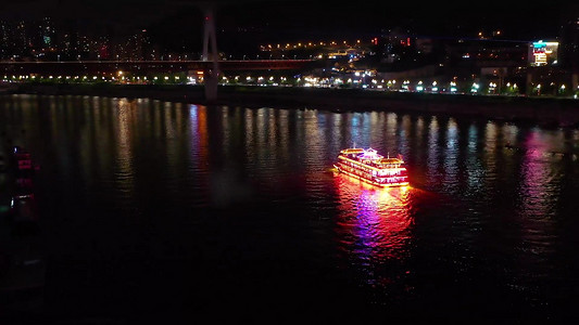 航拍重庆两江夜游行驶中的客轮邮轮