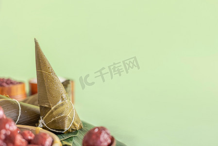 端午佳节大促销摄影照片_端午节传统节日美食粽子创意静物摄影图配图