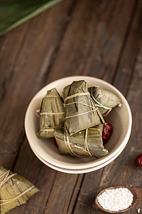 中国美食海报摄影照片_中式风格端午节粽子美食暗调摄影图配图