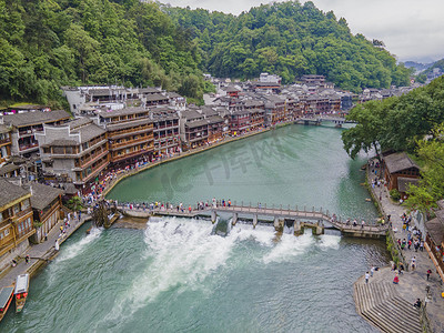 潮州古城摄影照片_城市中午凤凰古城景区江边无人机摄影图配图