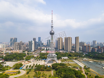 蓝天航拍摄影照片_航拍广东佛山电视塔城市摄影图配图