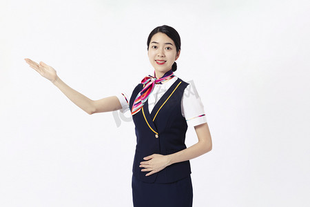 服务员服务员摄影照片_航空空乘空姐客舱欢迎摄影图配图
