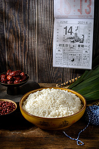 节日端午节一碗糯米中式木桌摆放摄影图配图