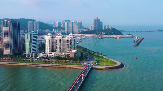房产摄影照片_珠海城市半岛建筑房产情侣南路交通滨海风光