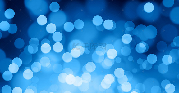 蓝色粒子背景背景图片_蓝色彩色光斑粒子背景光晕