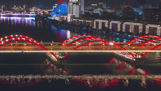 柳州夜景摄影照片_城市夜晚柳州文惠桥夜景岸边无人机摄影图配图