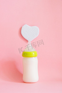 奶粉banner摄影照片_奶瓶婴儿幼儿奶粉母乳摄影图配图