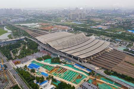 武汉城市建筑阴天建筑武汉火车站航拍俯视摄影图配图