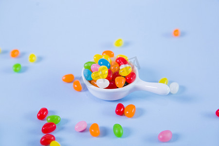 餐饮美食糖果桌面彩色糖纯底实拍创意背景摄影图配图