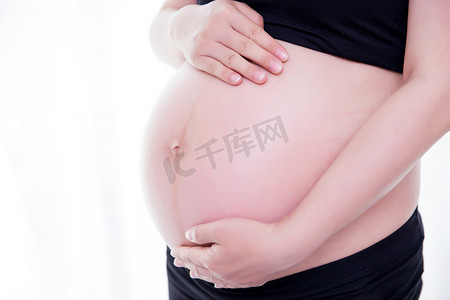 大肚子摄影照片_孕妈咪孕妇三胎二胎怀孕摄影图配图