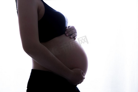 大肚子摄影照片_孕妈咪怀孕孕妇二胎三胎摄影图配图