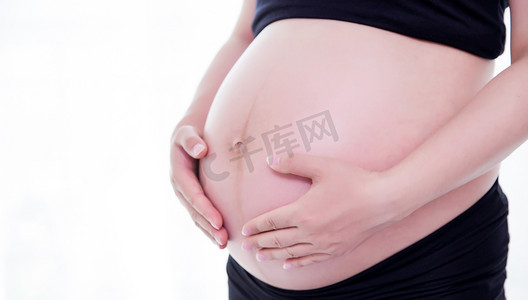 孕妈妈怀孕母亲二胎孕妇摄影图配图