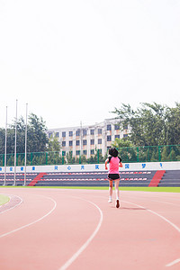 女生早上操场人物学校跑步摄影图配图