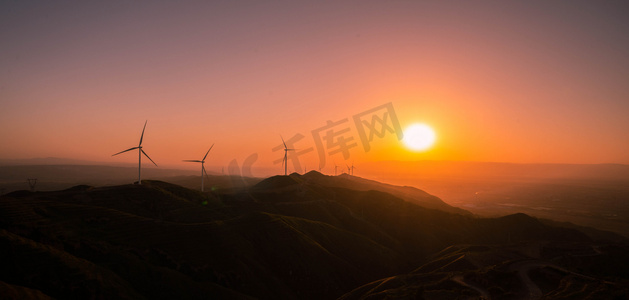 新能源晚上风车户外风力发电摄影图配图