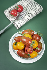 迷彩圖案摄影照片_营养特色品种迷彩西红柿摄影图配图