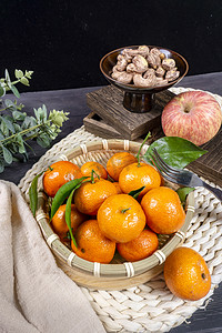 桔子摄影照片_营养美味新鲜多汁桔子摄影图配图