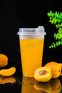 夏日冷饮鲜榨果汁杏子汁摄影图配图
