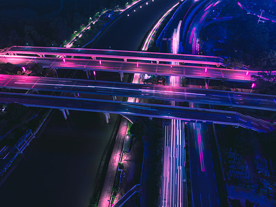 夜晚道路摄影照片_城市夜景车流赛博朋克风摄影图