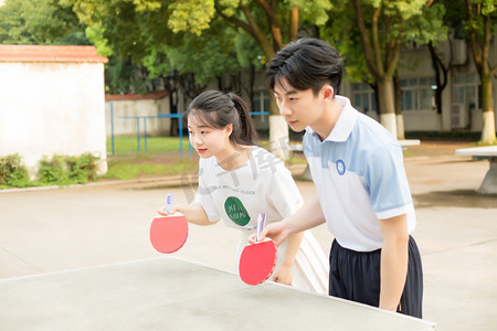 乒乓球帅哥学生美女双人摄影图配图