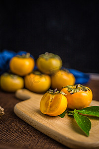 秋天柿子摄影图
