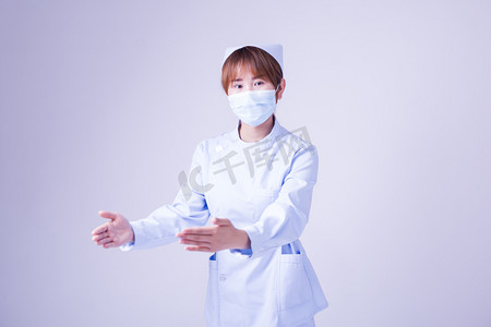 国际护士节摄影照片_护士医护医疗护士手势人像摄影图配图