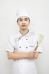金牌导师长图摄影照片_餐饮类白天厨师形象照厨房姿势摆拍摄影图配图