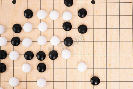 围棋白天棋子棋盘棋牌室手谈摄影图配图