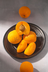 静物蔬果黄杏黄桃新鲜水果摄影图配图