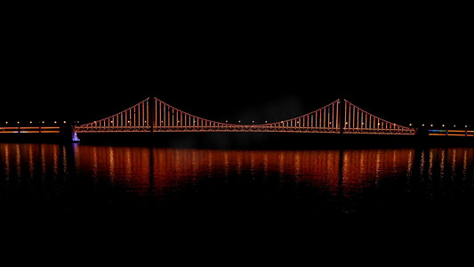 星海湾大桥夜景灯光秀摄影图