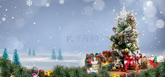 双旦雪地背景图片_雪地上的圣诞树