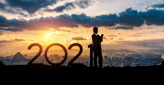 2021商务背景图片_2021商务剪影城市背景