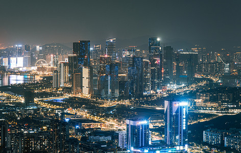 热闹的街市摄影照片_深圳城市夜晚金融商务大厦城市天际线繁荣热闹摄影图配图