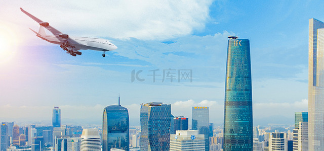 旅游简约大气背景图片_飞机城市天空商务城市建筑蓝天