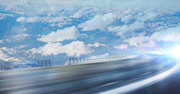 公路天空背景图片_云端山脉高速公路创意背景