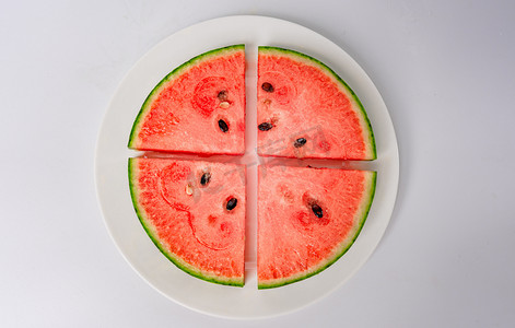 夏天美食白昼一盘西瓜室内影棚静物摆拍摄影图配图