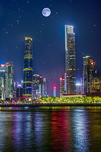 广州珠江双子塔广州博物馆月夜摄影图配图