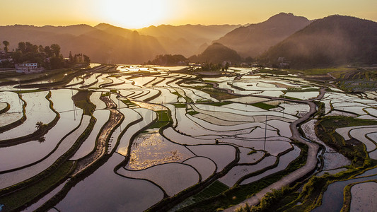 节约粮食摄影照片_梯田日落梯田夕阳无摄影图配图