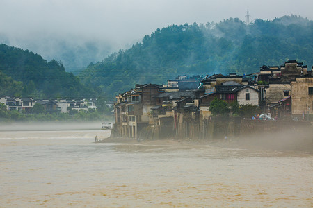 河南信阳摄影照片_河流洪水图片雨季洪水河流房屋户外无摄影图配图