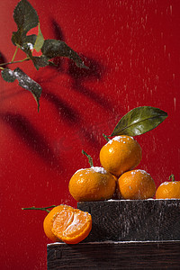 红色文化中国摄影照片_静物棚拍橘子新鲜橘子黄色橘子摄影图配图