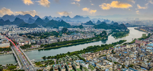 城市夕阳广西桂林城市风光航拍市区无人机摄影图配图