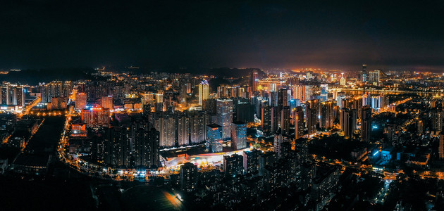 柳州风景摄影照片_城市夜晚广西柳州城市全景航拍楼顶无人机摄影图配图