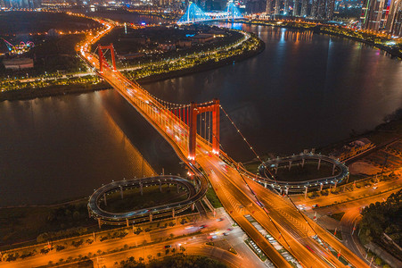 城市夜晚广西南宁良庆大桥风光夜景航拍岸边无人机摄影图配图